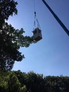 HVAC unit lifted by crane